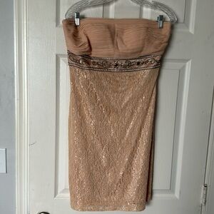 Peach colored strapless dress. Size 10. Worn once